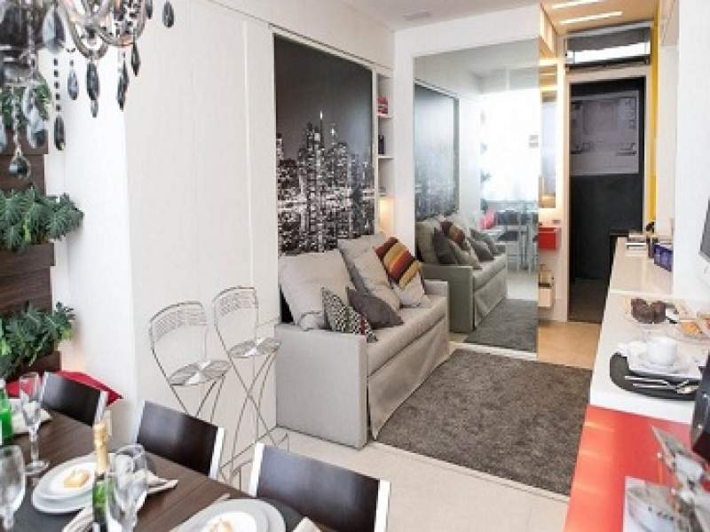 decoração sala vira quarto, e cozinha vira escritório em apartamento de 23m² em sp